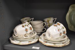 A selection of art deco era tea cups and saucers including Delphine
