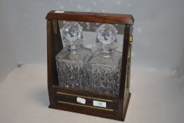 A vintage two decanter tantalus