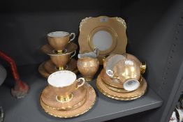 An early 20th Century Tuscan bone china tea service, comprising 6 cups and saucers, 6 , side
