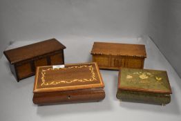 Four vintage jewellery boxes including two modelled as oak kists