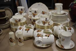 A 1960s FR Gray and sons ltd partial dinner service 'Aldridge' to include plates,cups,mugs, saucers,