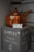 A simplex copper kettle with box