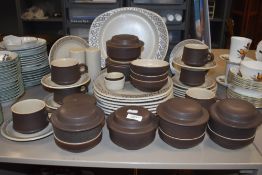 A quantity of stoneware dinner and teawares, with attractive speckled and geometric designs,