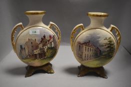 A pair of late 19th Century English moon flasks, having painted pictorial inns to one face and