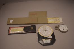 A selection of measuring and marking devices including Ashcroft thickness gauge and circular slide