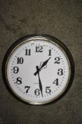 A large sized station style wall clock