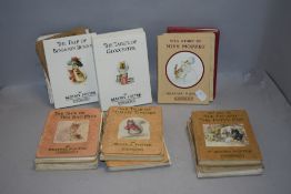 A selection of Beatrix Potter volumes including some early editions