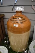 A large early 20th Century stoneware flagon, marked DF Pritchard Ltd Brewers,wine and spirit