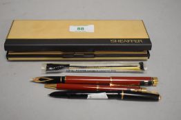 A selection of pens including Sheaffer
