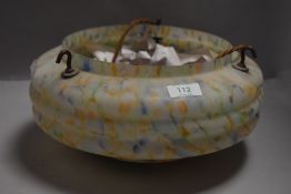 A vintage ceiling light fitting and shade, mottled glass design