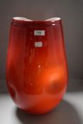 A large sized two tone red and white art glass vase aprox 50cm tall