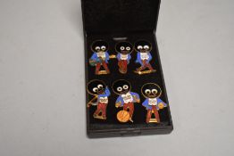 Six vintage Robertson's jam 'Golly' badges