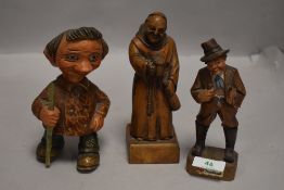 Three vintage treen figures including Austrian and Norwegian Troll