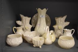 A collection of Belleek , various eras and designs including naturalistic and nautilus
