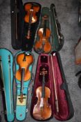Four student violins.