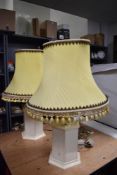 A pair of modern table lamps with vintage style shades