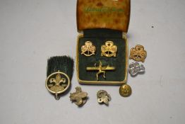 A selection of 20th century boy scout badges and pins