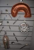 A selection of modern cutlery, two vintage fish moulds and a jelly mould