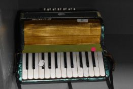 A vintage child's piano accordion, badged Francesco
