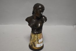A Victorian bronze bust of a female with ladybird on shoulder signed J. Garnier on stone base