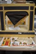 A mid century miniature theatre style play house set with Pollock's Juvenile drama play sets