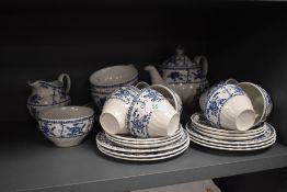 A vintage English tea service , blue and white transfer print, impressed marks to base