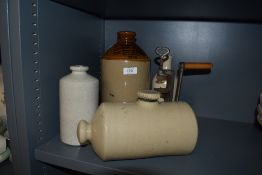 A selection of glazed stoneware items including flagon and bed bottles
