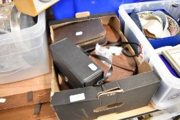 A selection of leather bags and brush set