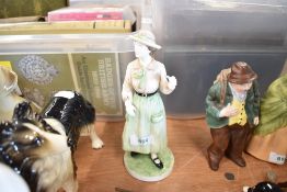A modern figurine of a tennis player by Coalport modelled by John Bromley