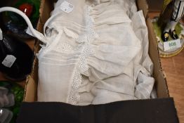 An Edwardian christening gown having lace work details