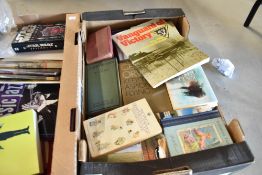 A selection of text library and reference books including Beatrix Potter