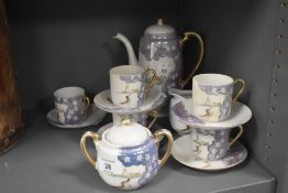 A Japanese part tea service in egg shell decorated with an English style fantasy scene