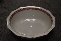 An early 20th century wash basin having rose transfer pattern and gilt detailing.