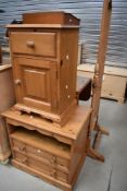 A modern pine bedside cabinet and TV unit