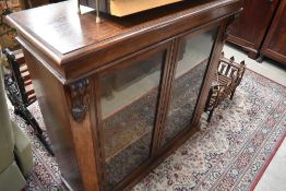 A Victorian oak low bookcase, width approx. 100cm
