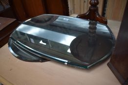 Two vintage frameless wall mirrors