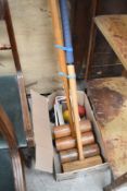 A selection of vintage croquet equipment