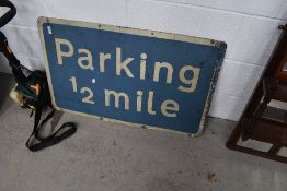 A metal Parking sign