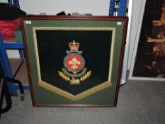 A framed military The Kings' band drape showing 'The Kings' badge 22
