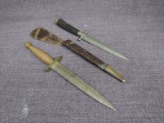 An English Fairburn-Sykes 3rd pattern 1942 onwards with turned ribbed grip, straight double edged