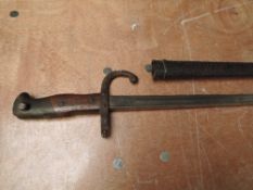A French Epee Gras Rifle Bayonet model 1874 with metal scabbard, on blade edge St Etienne 1879,