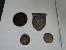 A German Badge, Hitlers Dank Fur Den Dienst Am Volke surrounding Hitlers head, on reverse Paulmann &