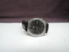 A vintage Seiko Automatic Wrist Watch with leather strap, number on reverse 876542