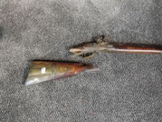 A Flintlock Musket, barrel length 114cm, stock broken off, compartment in stock, in need of