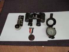 A pair of Bausch and Lomb Zeiss Prism Stereo 8x25 Binoculars, a Morse Code Key having bakelite