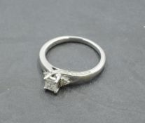 A diamond solitaire dress ring having a princess cut diamond, approx 0.4ct in a 4 claw mount to