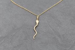 A 9ct gold snake pendant on a 9ct gold fine rope chain, approx 18' & 2.9g