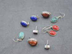 Five pairs of silver and polished stone stud and loop drop earrings including lapis lazuli,