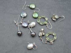 Five pairs of silver and pearl and mineral loop drop earrings including moonstone, baroque pearl
