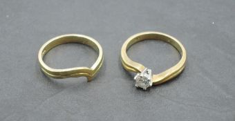 A diamond solitaire ring, approx 0.45ct in a six claw set mount to cross over shoulders on an 18ct